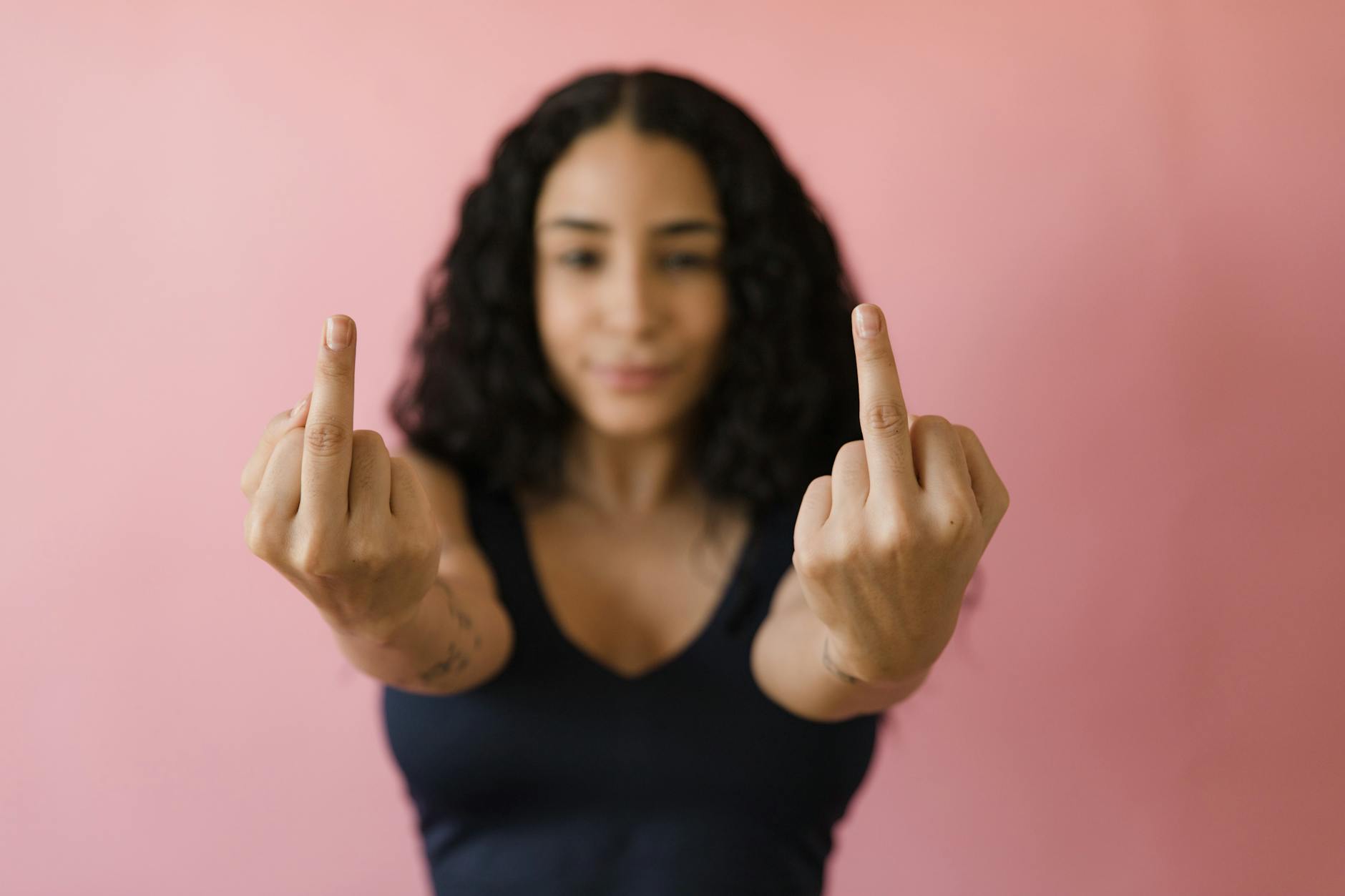 a woman flashing the finger