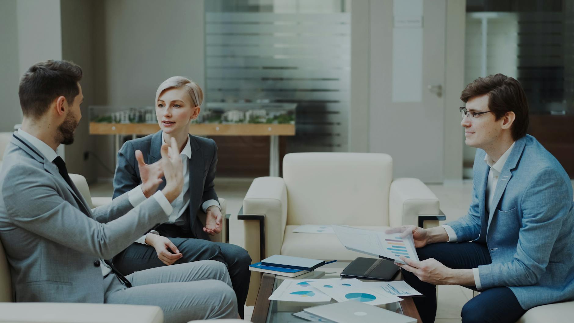 business meeting in modern office setting