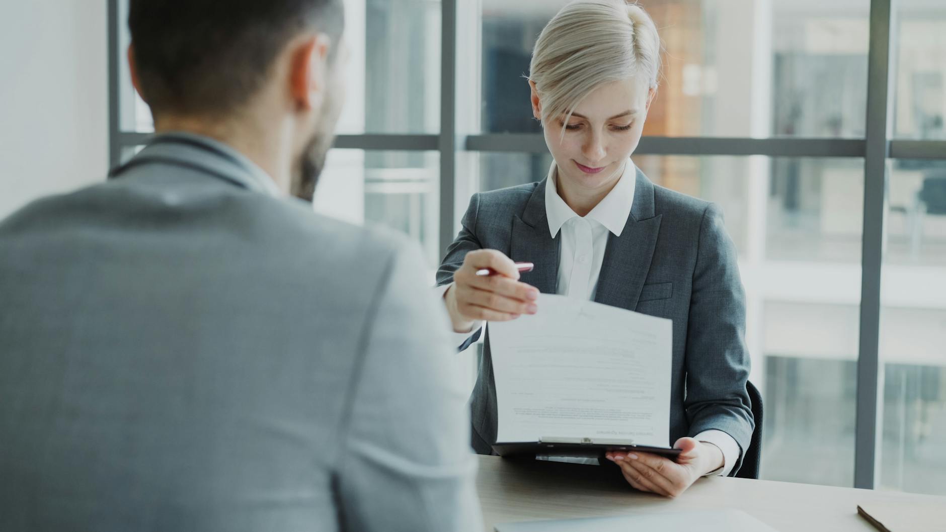business meeting with contract review in office