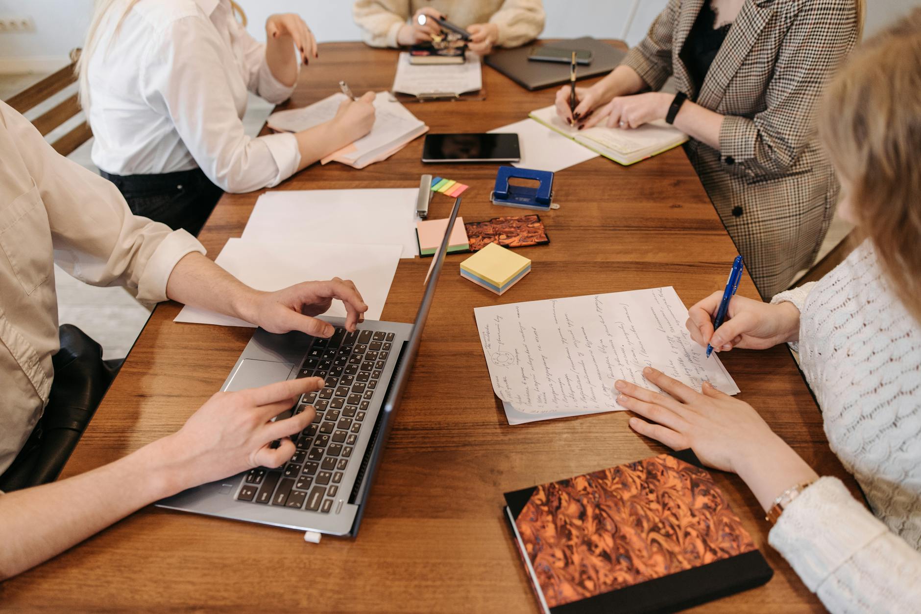 a group of people having a meeting