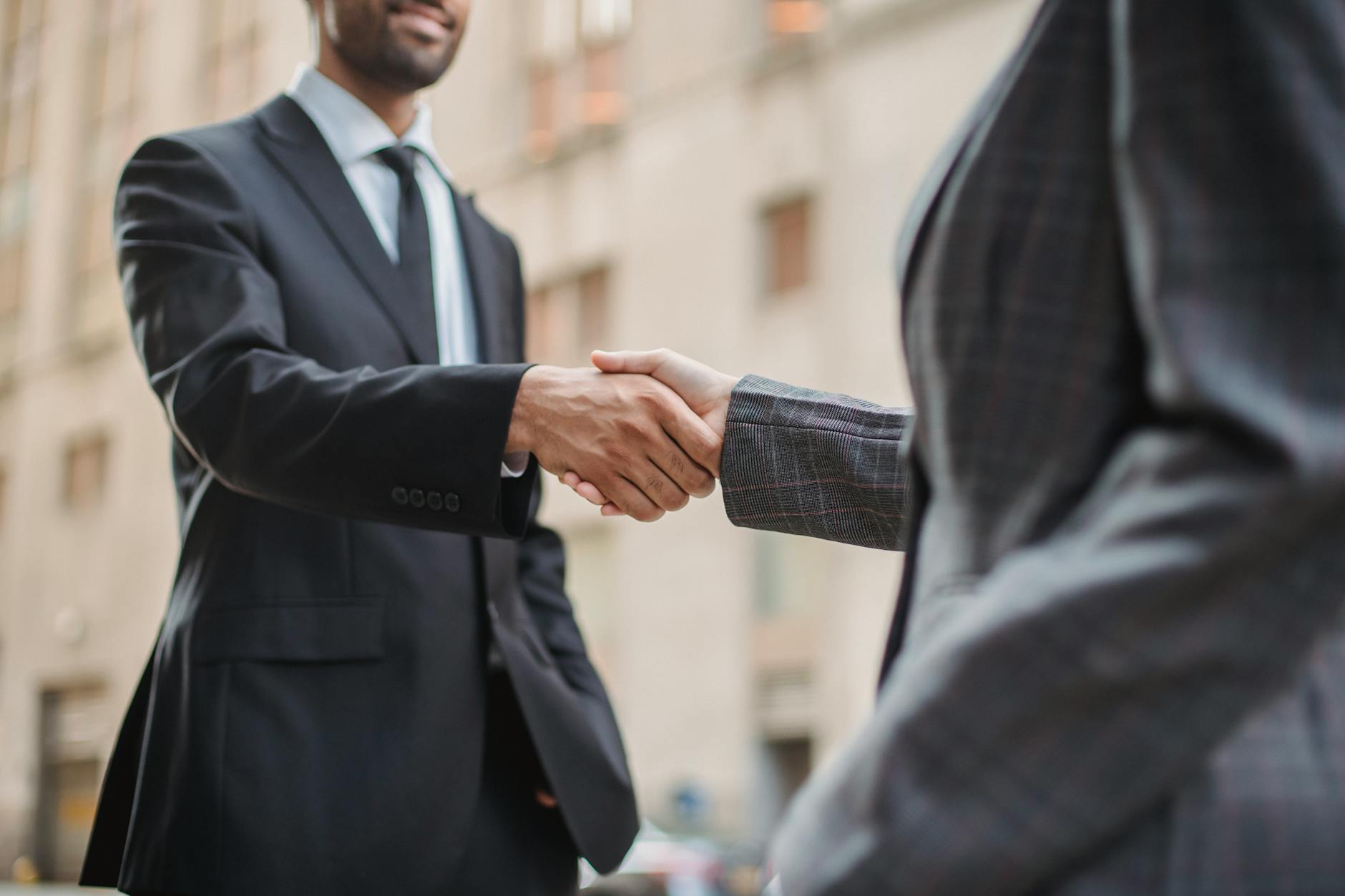 two people shaking hands