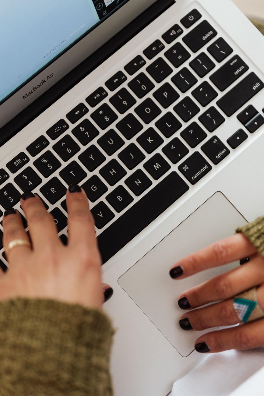 a person using a macbook air